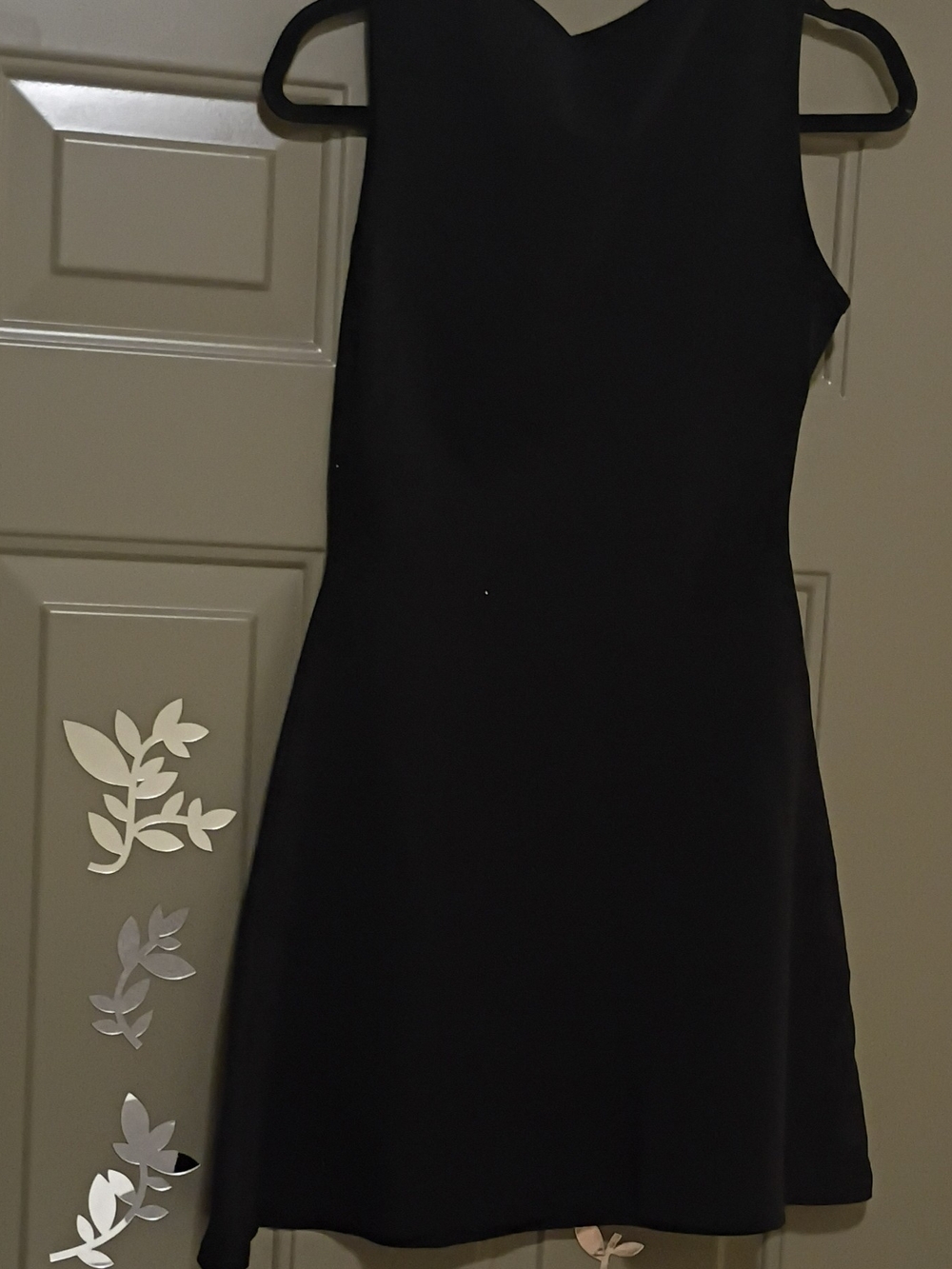 Classic Black Sleeveless Mini Dress — V-Neck Elegance